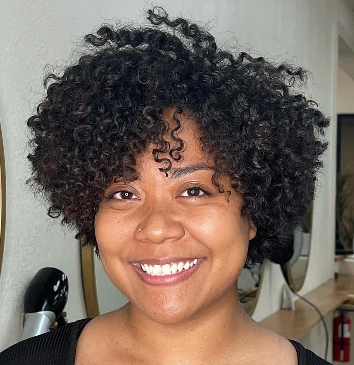 Embrace your natural curl pattern with these curl care tips. Learn about curl types and boost your hair confidence. Curls Gone Wild Salon is the premier curly hair salon in Gilbert, Arizona. Offering a comprehensive experience focusing on education, clients leave looking their best with their curly hair and also knowing how to take care of their curly hair.