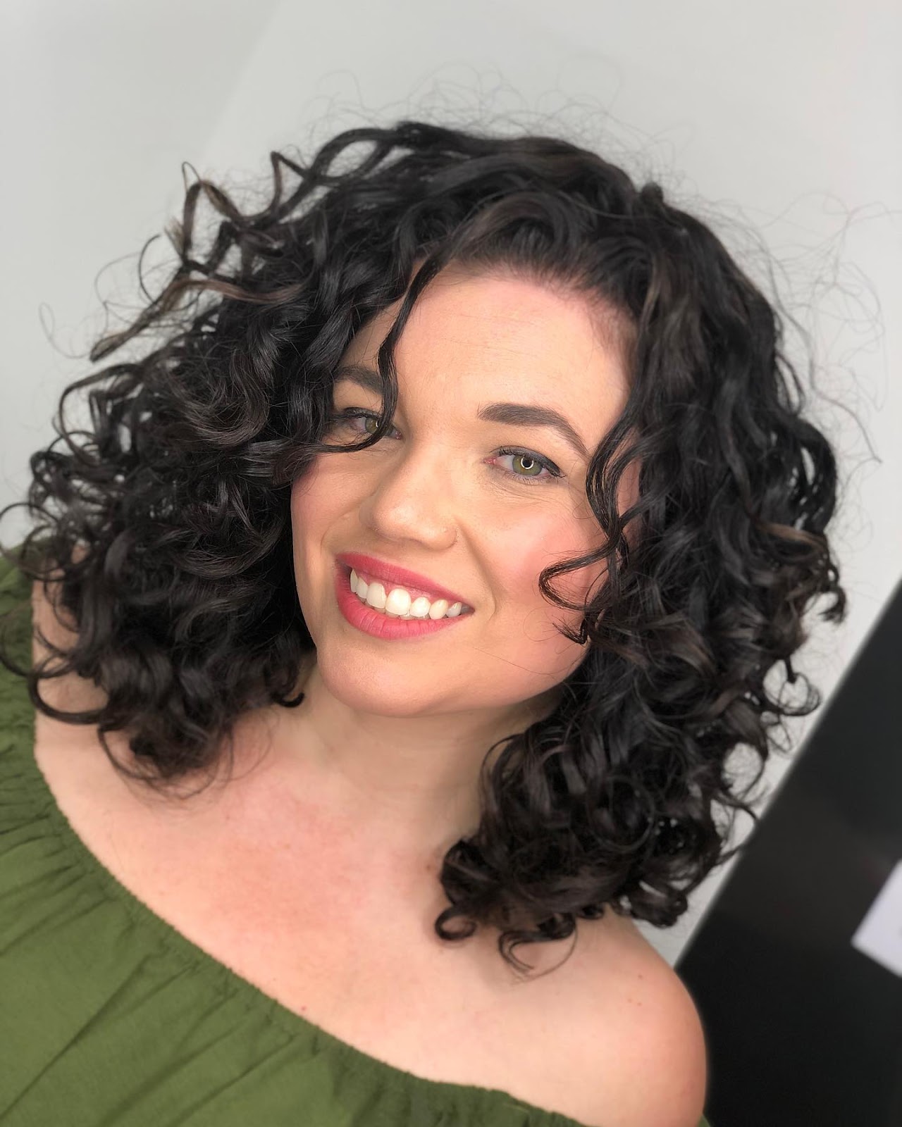 Learn how Curls Gone Wild Salon, Gilbert's top rated curly hair salon, helps clients recover their natural curl pattern from hair straightening damage. Excessive heat damage has stunted curl recovery and your natural beauty. Come learn how you can reignite your love for your curly hair! Gilbert hair salon for curly hair, curly hair salon in Gilbert, Curly hair cut in Gilbert.