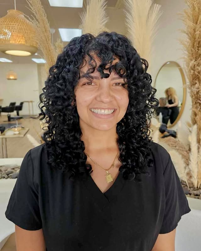 Learn how Curls Gone Wild Salon, Gilbert's top rated curly hair salon, helps clients recover their natural curl pattern from hair straightening damage. Excessive heat damage has stunted curl recovery and your natural beauty. Come learn how you can reignite your love for your curly hair! Gilbert hair salon for curly hair, curly hair salon in Gilbert, Curly hair cut in Gilbert.